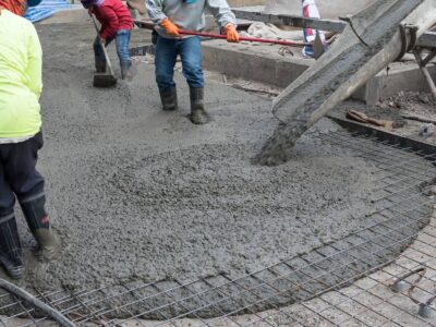 This is an image of poured cement distributed by a team of contractors.